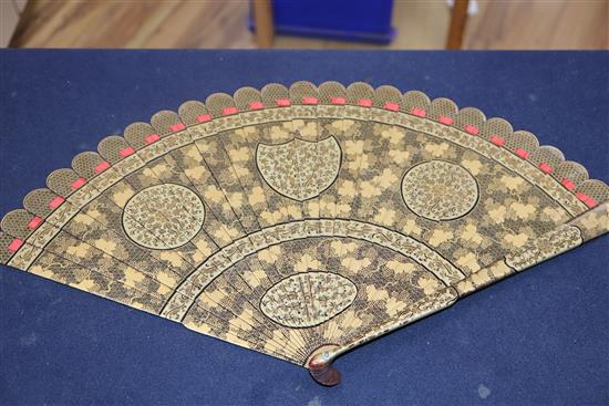 A Chinese lacquer fan and two others